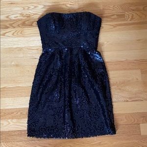 Sequined black tube dress
